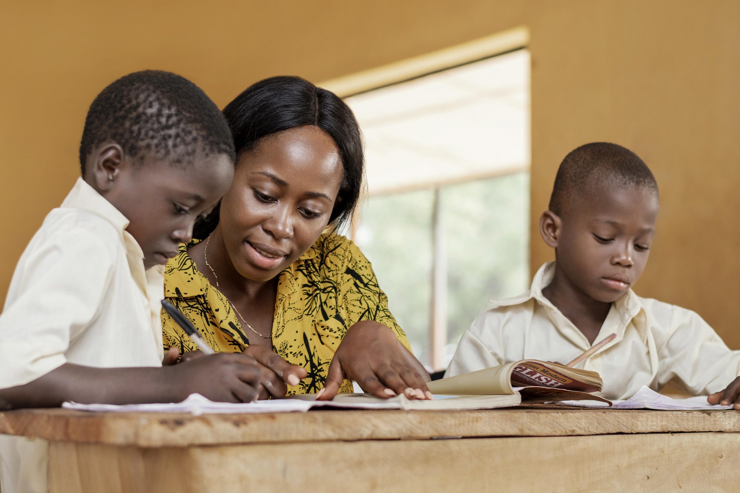 teacher-helping-kids-class teacher-helping-kids-class